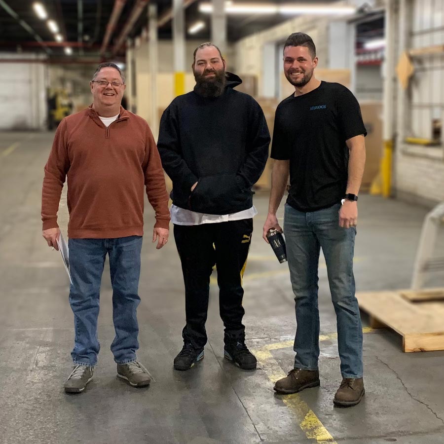 Images of KFI Studios employee in warehouse